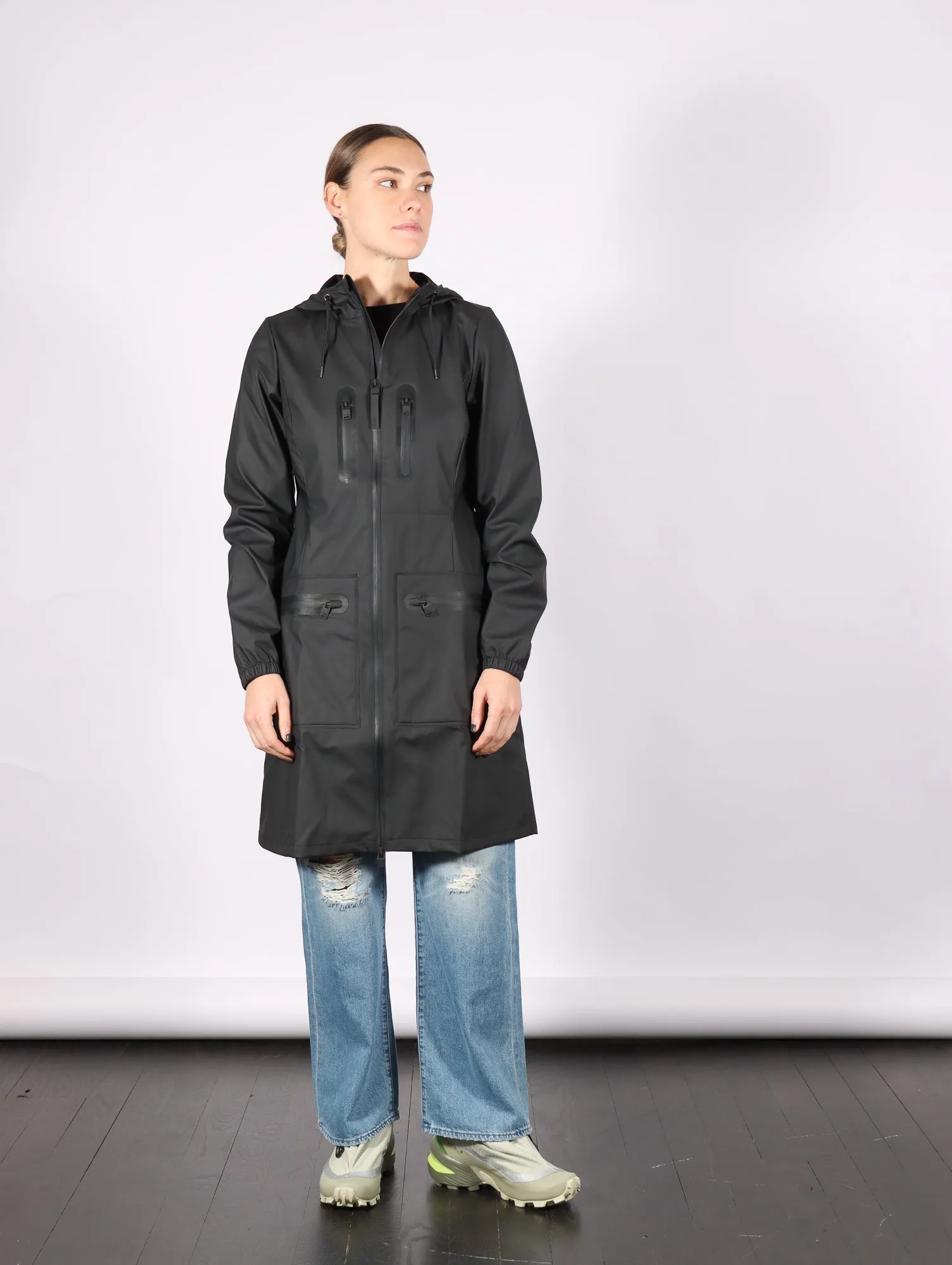 Cargo Curve W Jacket in Black by RAINS